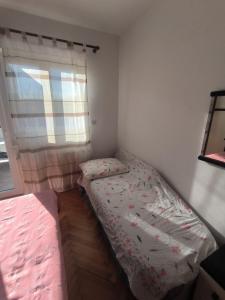 Postel nebo postele na pokoji v ubytování Apartman Marija