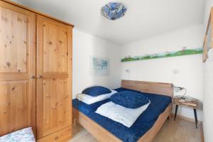 Postel nebo postele na pokoji v ubytování Hello Zeeland - Vakantiehuis Duinroos 133