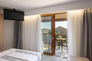 Posteľ alebo postele v izbe v ubytovaní Neoma Luxury Residence - Adults Only + 37 fotografií