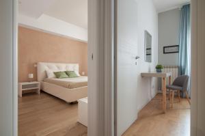a living room with a couch and a table at Urbanflat Repubblica Square in Rome