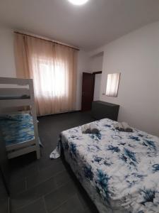 Postel nebo postele na pokoji v ubytování Casa Santina