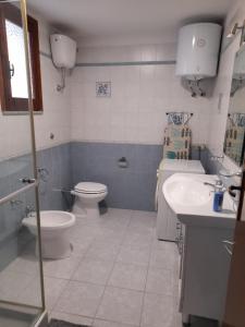 Koupelna v ubytování Casa Santina + 22 fotografií