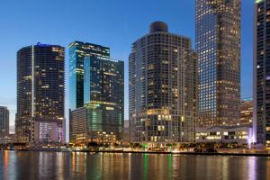 a city skyline with tall buildings at night at JW Marriott Marquis Miami in Miami