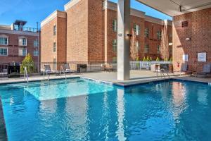 a swimming pool in front of a building at Residence Inn by Marriott Nashville Green Hills in Nashville