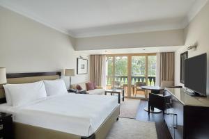 Postel nebo postele na pokoji v ubytování Marriott Mena House, Cairo