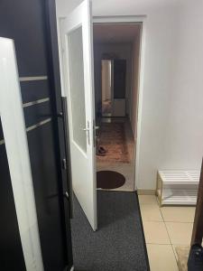 a hallway with an open door to a room at Wohnung in Sonnberg