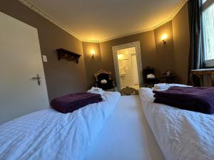Rúm í herbergi á Historisches Hotel Bären
