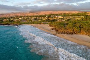 an aerial view of a beach with a resort at The Westin Hapuna Beach Resort in Hapuna Beach