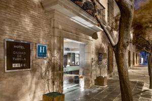 a building with a sign on the side of it at AC Hotel Ciudad de Tudela by Marriott in Tudela