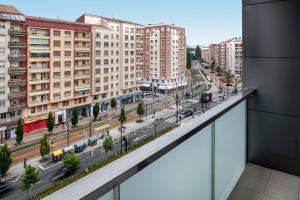 a balcony with a view of a city at B&B HOTEL Vitoria General Álava in Vitoria-Gasteiz