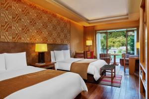 Cama ou camas em um quarto em Tambo del Inka, a Luxury Collection Resort & Spa, Valle Sagrado