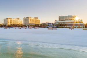 a view of a beach with buildings and the ocean at JW Marriott Marco Island Beach Resort in Marco Island