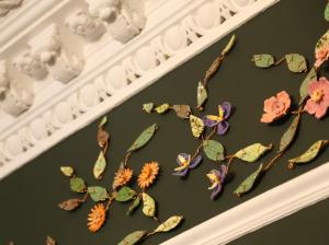 a group of leaves and flowers on a wall at Barony House in Edinburgh