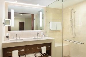 a bathroom with a sink and a shower at JW Marriott Marco Island Beach Resort in Marco Island