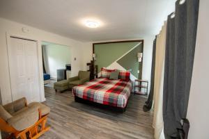 Cama o camas de una habitación en Motel Fleur de Lys