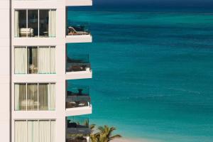 an aerial view of a building overlooking the ocean at The Ritz-Carlton, Turks & Caicos in Providenciales