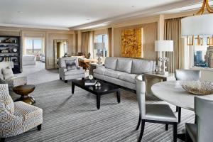 a living room with a couch and a table at The Ritz Carlton, Pentagon City in Arlington