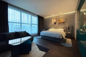 Ein Bett oder Betten in einem Zimmer der Unterkunft RYSE, Autograph Collection by Marriott