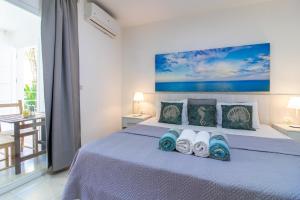 Postel nebo postele na pokoji v ubytování Modern Apartments in Los Corales - Bavaro Beach