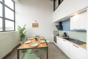 Kuchyňa alebo kuchynka v ubytovaní WELCOME LOFT