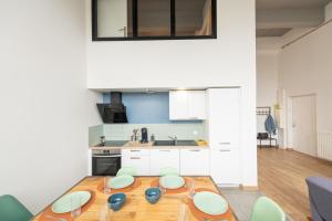 Kuchyňa alebo kuchynka v ubytovaní WELCOME LOFT
