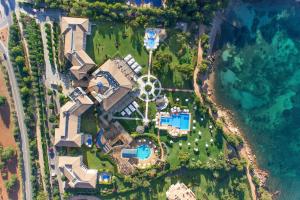 an aerial view of a house with a theme park at The St. Regis Mardavall Mallorca Resort in Portals Nous