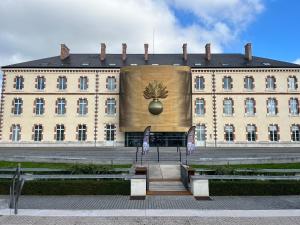 a large building with a pineapple on the front of it at Studio du château in Vaux-le-Pénil