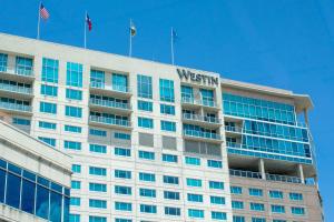 a building with the words westin on top of it at The Westin Houston, Memorial City in Houston