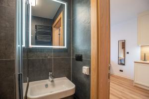 Kúpeľňa v ubytovaní Apartamenty na Uroczysku