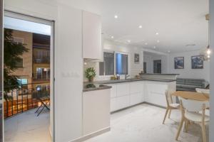 Η κουζίνα ή μικρή κουζίνα στο Luxury Apartment Fuengirola