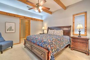 a bedroom with a bed and a ceiling fan at Lakehills Vacation Rental on Medina Lake in Lakehills