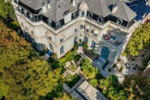 an overhead view of a large white house at Santo Mauro, a Luxury Collection Hotel, Madrid in Madrid +218 photos