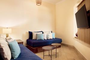 Телевизор и/или развлекательный центр в The Westin Reserva Conchal, an All-Inclusive Golf Resort & Spa