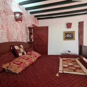 Krevet ili kreveti u jedinici u okviru objekta Charming 2-Bed Cottage in Bodo a fishing village