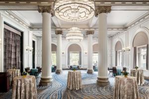 a large room with columns and a chandelier at The Westin St. Francis San Francisco on Union Square in San Francisco