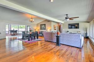 a living room with a couch and a table at ScottsdaleandParadise Valley Estate 2 Mi to Old Town in Scottsdale