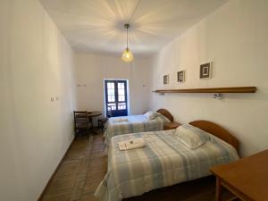 Postel nebo postele na pokoji v ubytování Flying Dog Hostel Cusco