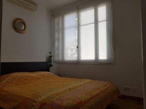 Posteľ alebo postele v izbe v ubytovaní Nice & Les Cypres