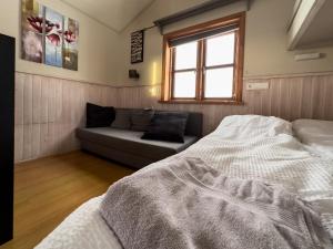 Posteľ alebo postele v izbe v ubytovaní Gotta Cottages