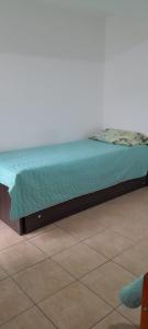 Una cama o camas en una habitación de MyR alojamientos 2