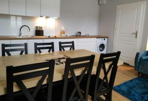 Kuchyňa alebo kuchynka v ubytovaní Hugo VIP Apartments