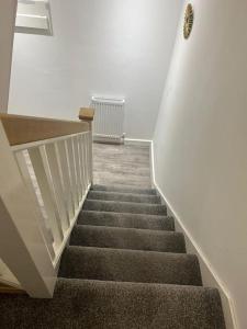 a staircase in a building with a stair case at 2 bed Penthouse in Liverpool City Centre in Liverpool