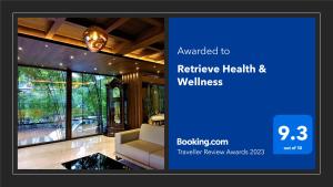 a picture of a living room with a couch at Retrieve Health & Wellness in Cochin