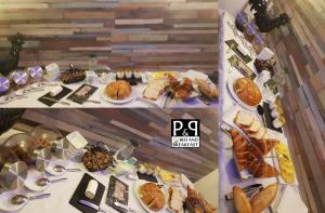 a table topped with plates of food and desserts at Bed and Breakfast P&P Nîmes-Centre in Nîmes