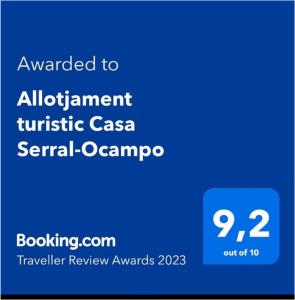 a blue sign that says awarded to adjustment turtlescaza serial camro at Allotjament turistic Casa Serral-Ocampo in Deltebre