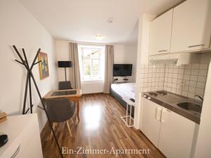 Kuchyňa alebo kuchynka v ubytovaní Astoria Apartments