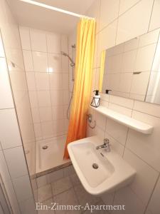 Kúpeľňa v ubytovaní Astoria Apartments