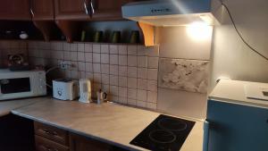 Kuchyňa alebo kuchynka v ubytovaní Kettő Ciprus Apartman