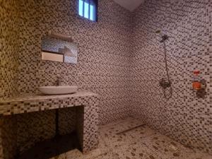 Afbeelding uit fotogalerij van AUBERGE LA PRALINE in Soukouta