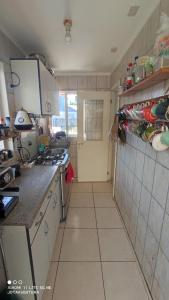 Virtuvė arba virtuvėlė apgyvendinimo įstaigoje Casita de Sara